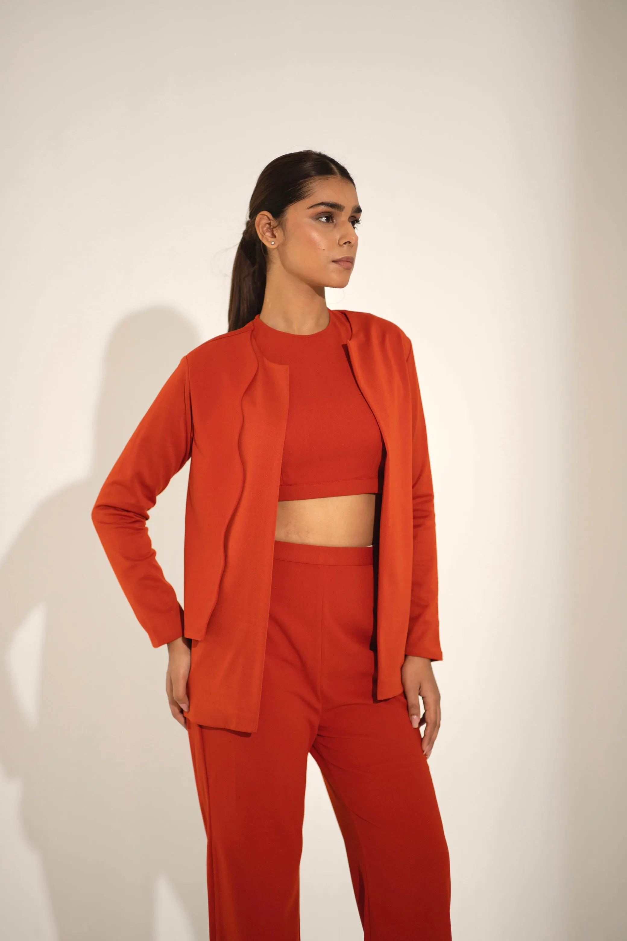 Orange Co-ord Set with an asymmetric flap jacket for Ladies